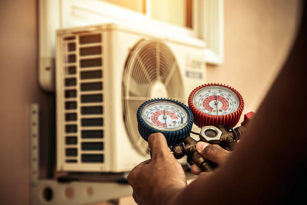 Professional Hvac technician working in Etowah, NC